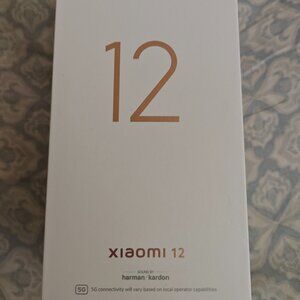 xiaomi mi 12 in purple used for a couple of months, updated to android 14